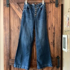 Super high waisted wide leg button fly jeans.